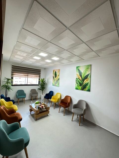 Seating area in the waiting room of Centre Dentaire BAHA